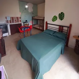 Quarto em Acomodações Particulares Suítes Monte Alto, Maré Arraial, Arraial do Cabo